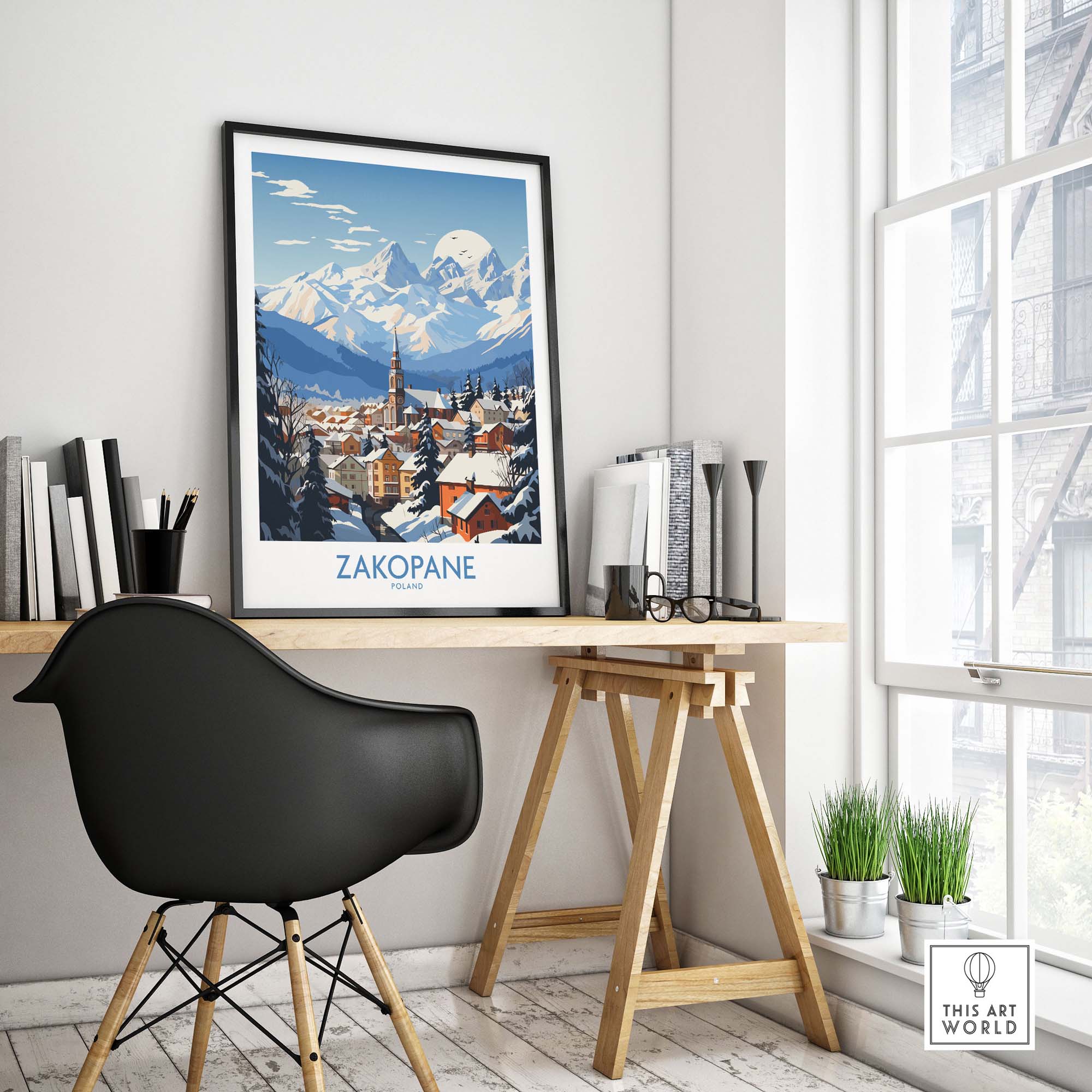 Zakopane travel poster displayed in a modern workspace, showcasing the picturesque mountains and ski resort charm of Poland.