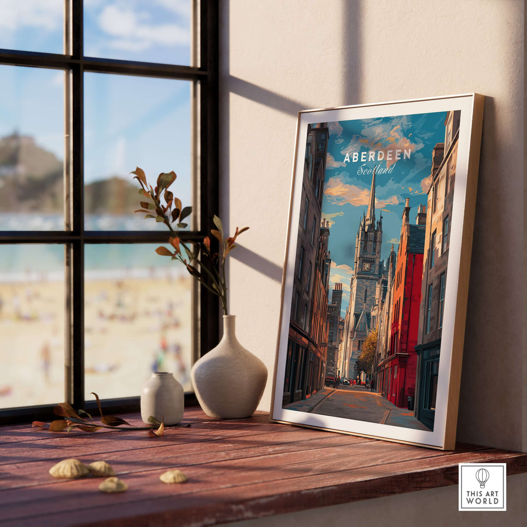 Aberdeen Poster | Scottish Cityscape Wall Art displayed on a ledge near a window, showcasing the city's vibrant architecture.