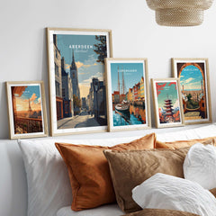 Aberdeen Print | Scottish Landmark Wall Art displayed in stylish frames on a cozy bed with cushions.