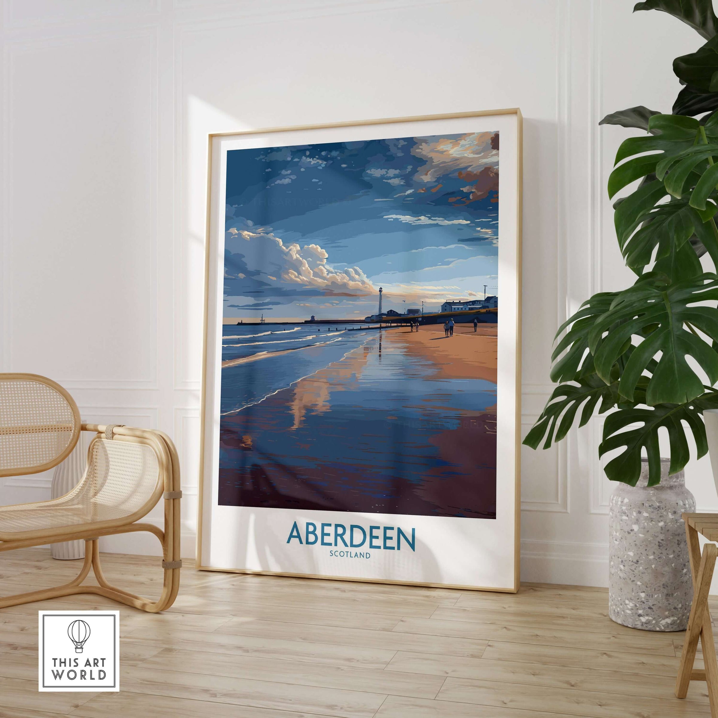 Aberdeen Scotland Beach Art Print | Coastal Travel Wall Decor displayed in a stylish interior setting with a chair and plant.