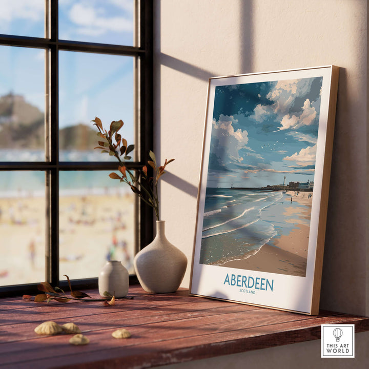 Aberdeen Scotland Bright Beach Scene Art Print | Coastal Poster displayed on a windowsill with beach view.
