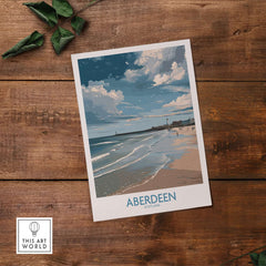 Aberdeen Scotland Bright Beach Scene Art Print | Coastal Poster on wooden surface with green leaves.