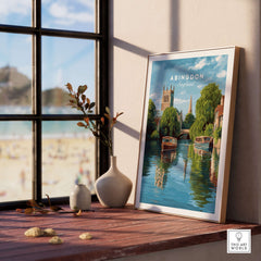 Abingdon England River Boats Art Print - Picturesque Town Poster displayed on a windowsill with river view.