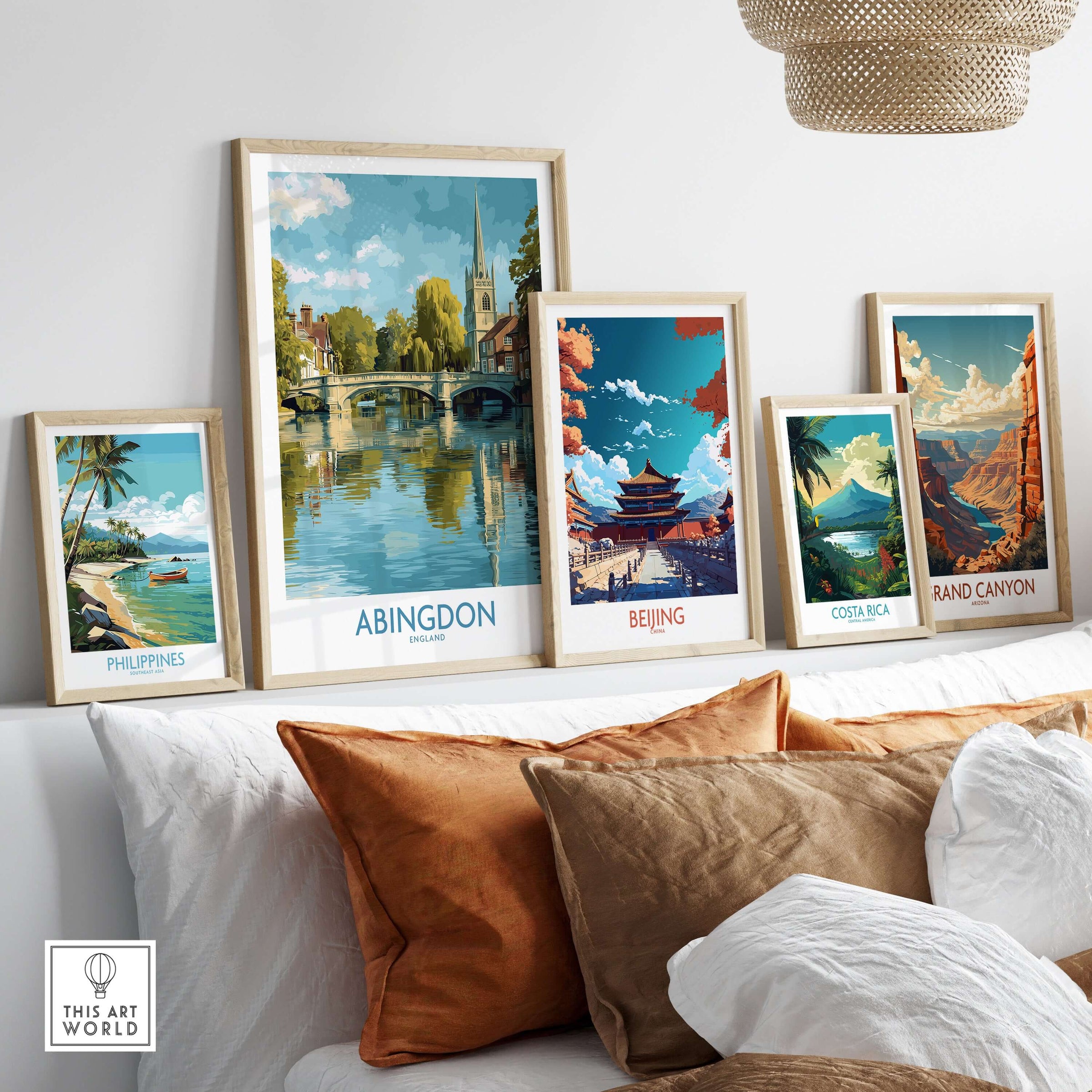 Abingdon Thames Valley Artwork - English Village Travel Poster displayed among other travel posters in a stylish living room.