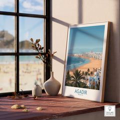 Agadir Morocco Print – Panoramic Beach and Palm Tree Wall Decor displayed on a wooden table with a view of the beach.