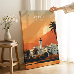 Agadir Travel Poster – Moroccan Mosque and Desert Sunset Art showcased in a cozy living room setting.