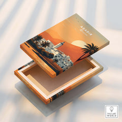 Agadir Travel Poster – Moroccan Mosque and Desert Sunset Art displayed on an open box with a scenic design.