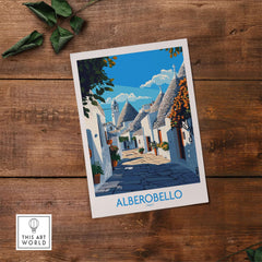 Alberobello Travel Poster featuring a picturesque street scene of Alberobello, Italy.