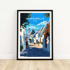 Alberobello Travel Print showcasing the scenic streets of Alberobello, Italy with unique homes and vibrant plants.