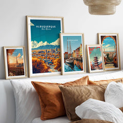 Albuquerque Wall Art displayed in stylish frames on a cozy bed with decorative pillows.