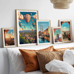 Albuquerque Wall Art Poster among framed cityscape posters on a stylish bed with decorative pillows.