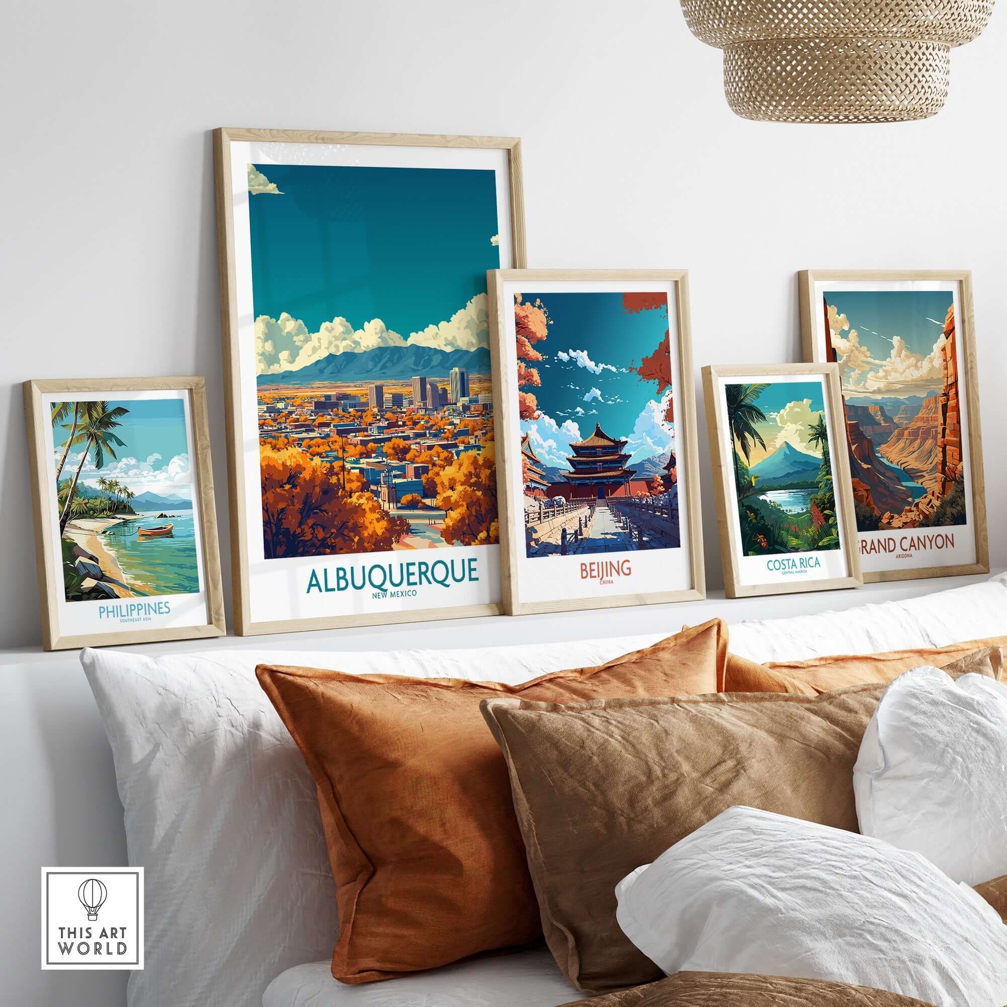 Albuquerque Wall Art Print displayed among other travel-themed artwork on a stylish couch.