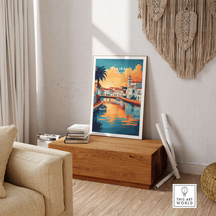 Algarve Tavira poster featuring vibrant sunset colors as wall decor in a cozy living room setting.