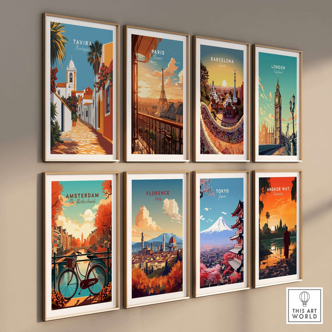 Collection of framed city posters including Tavira, Paris, Barcelona, and Tokyo on a gallery wall.
