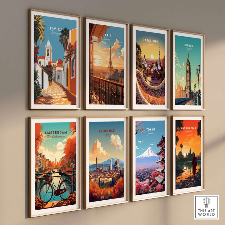 Collection of framed city posters including Tavira, Paris, Barcelona, and Tokyo on a gallery wall.