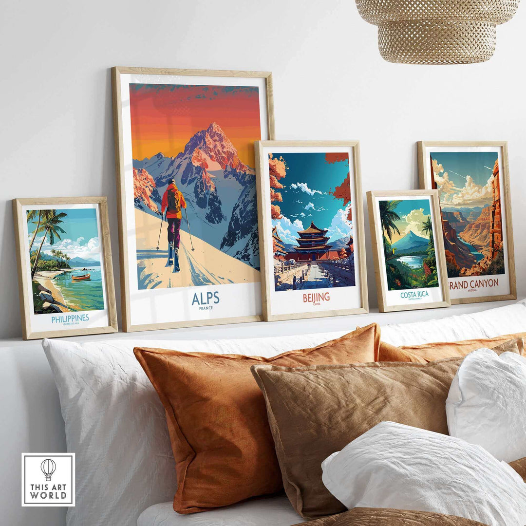 Collection of vibrant travel posters including Alps, Beijing, Costa Rica, Grand Canyon, and Philippines displayed on a wall above a couch.