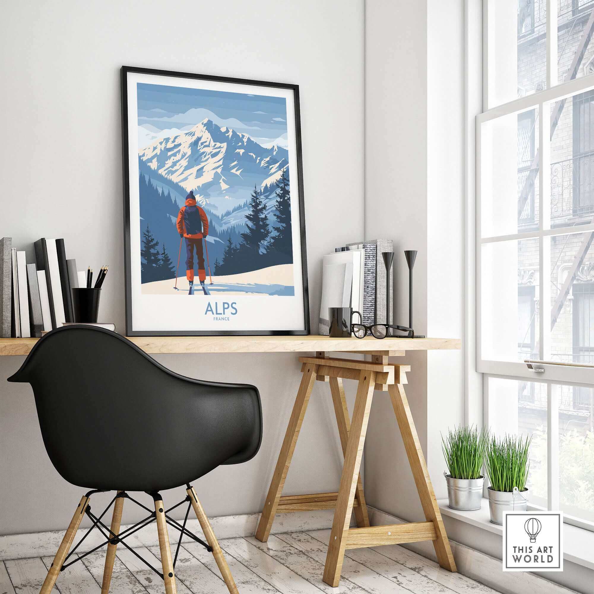 Alps ski print displayed in a modern workspace, featuring snow-capped mountains and a skier. Perfect for ski enthusiasts.