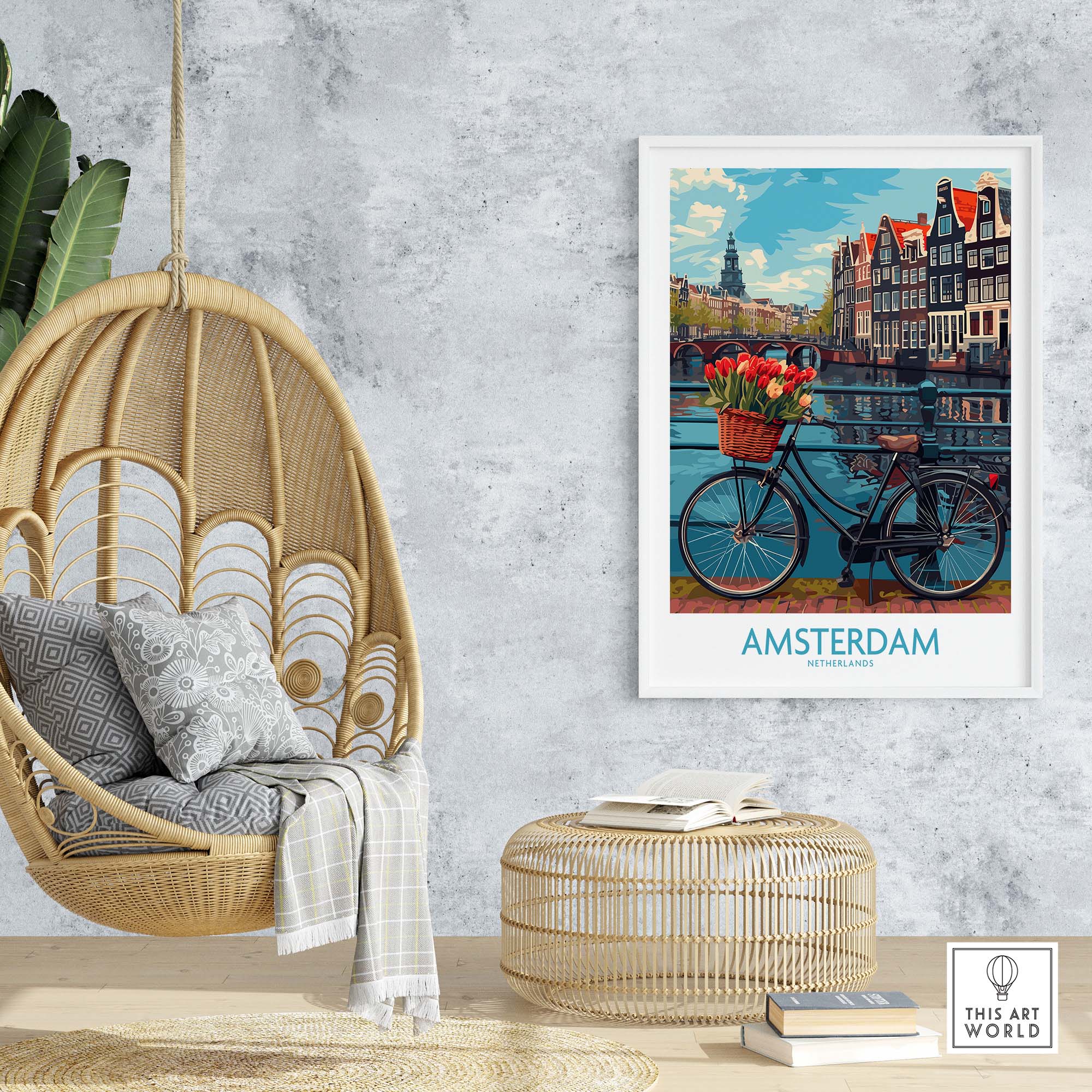 Amsterdam poster with bike and tulips on a wall, next to a rattan chair and table, creating a cozy home decor setting.