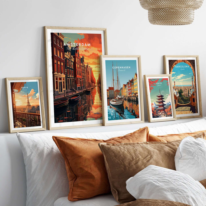 Framed Amsterdam Sunset Canal wall art print with vibrant colors, displayed above a cozy sofa with decorative pillows.
