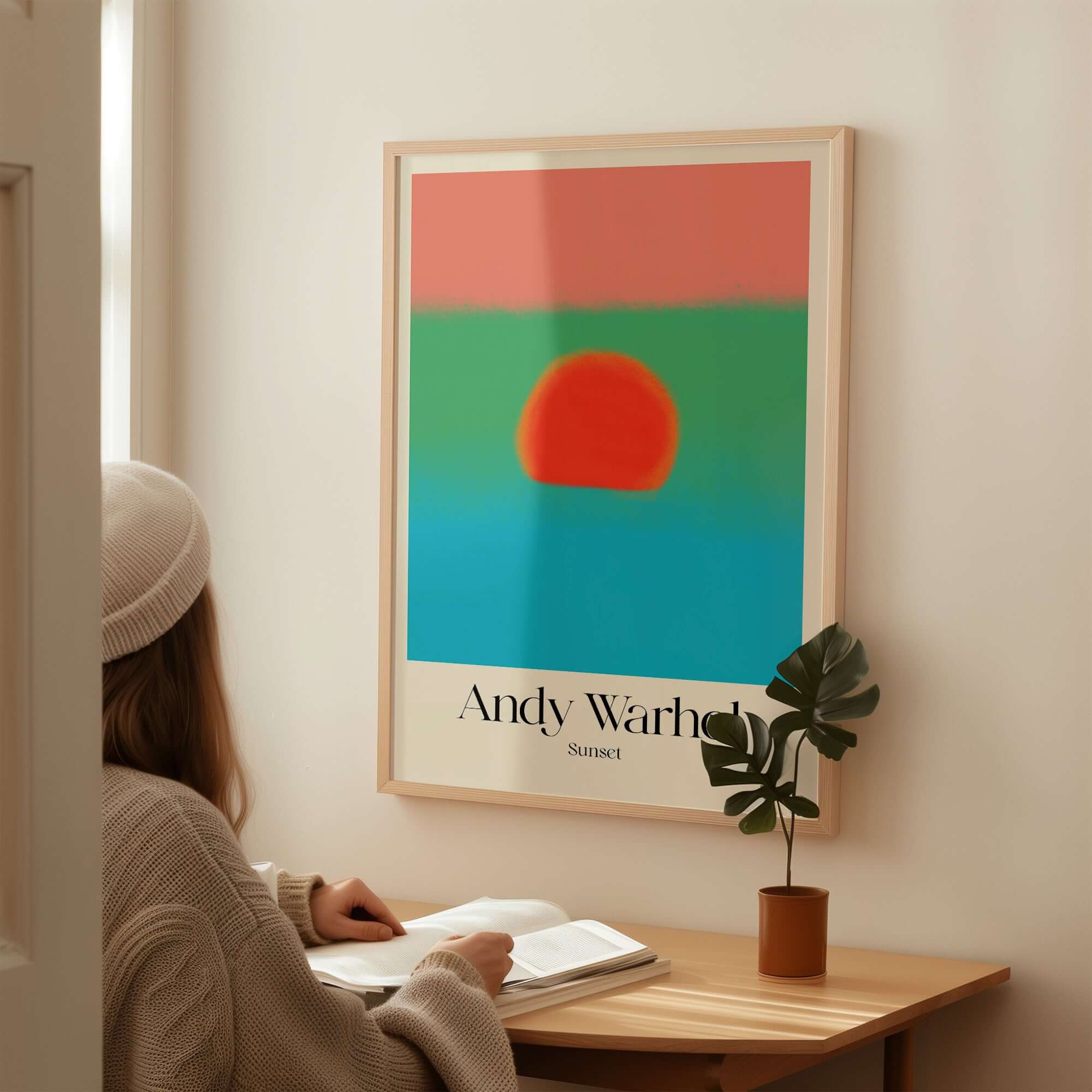 Andy Warhol Sunset Coral Green Blue Pop Art Poster Abstract Wall Art Print Modern on display in a cozy interior setting.