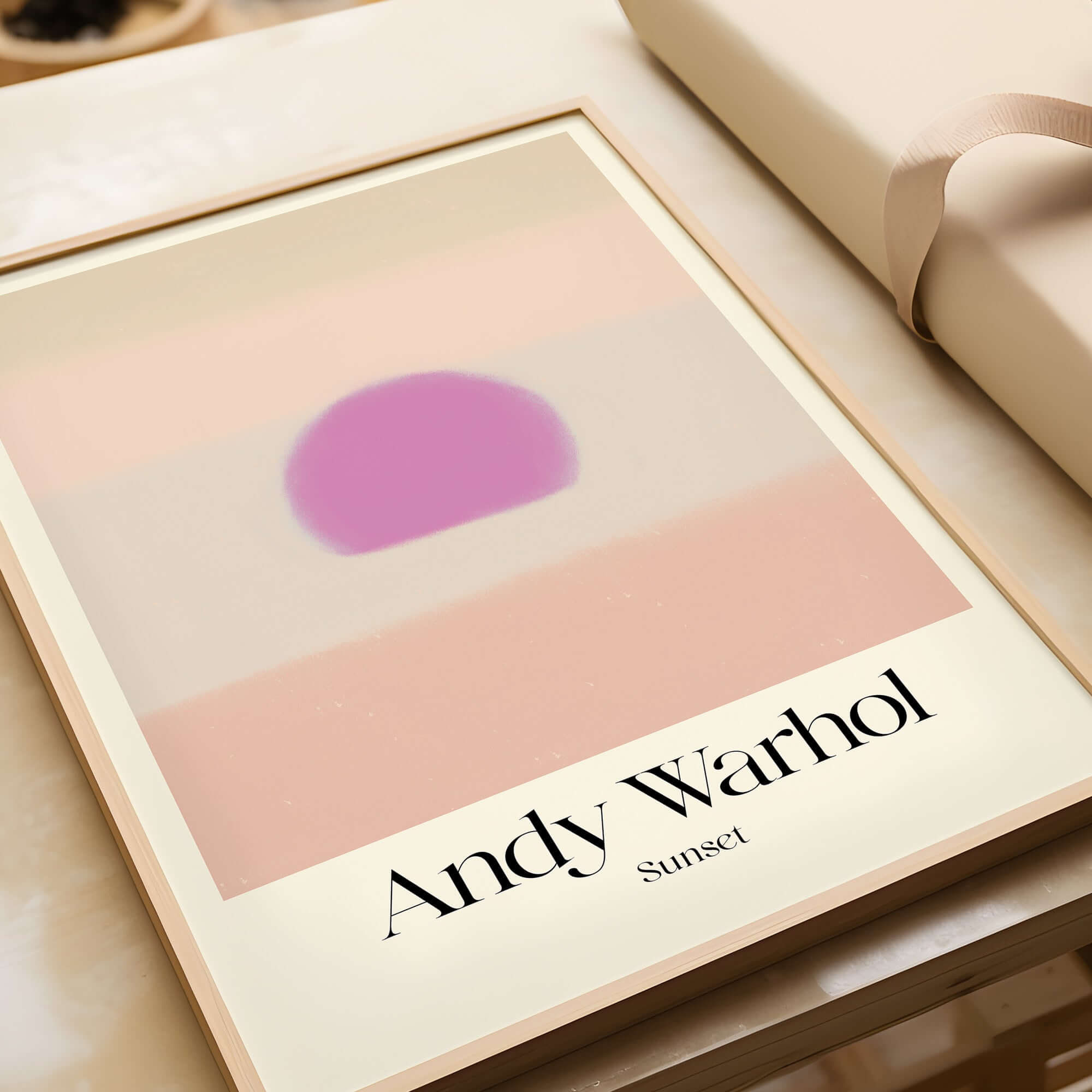 Andy Warhol Sunset Pastel Pink Purple Pop Art Print Subtle Abstract Poster Wall Art displayed in a frame.