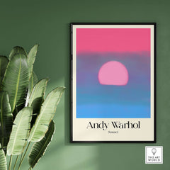 Andy Warhol Sunset Pink Blue Pop Art Poster Abstract Screenprint Wall Art Print displayed on a green wall.