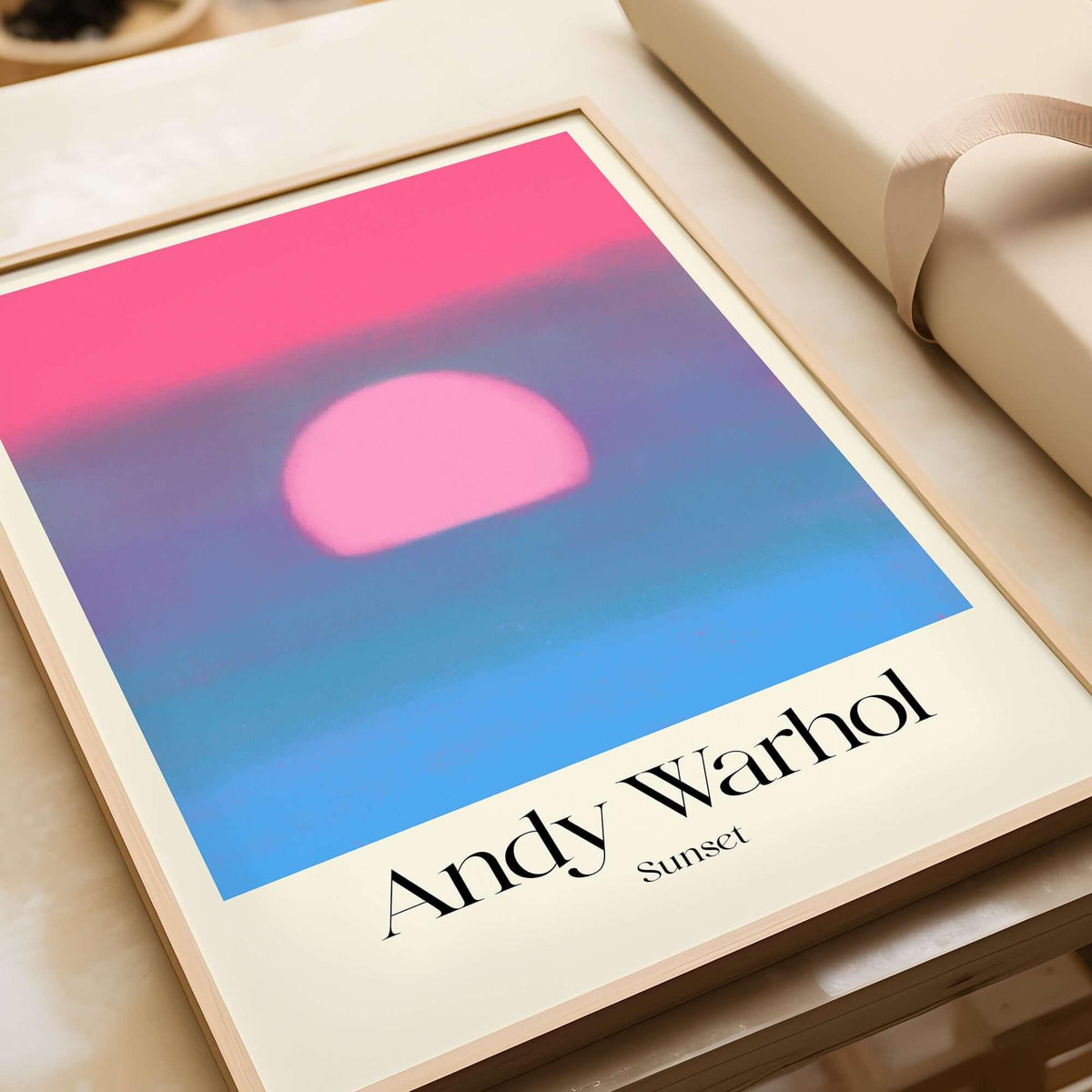 Andy Warhol Sunset Pink Blue Pop Art Poster Abstract Screenprint Wall Art Print displayed in a modern frame.