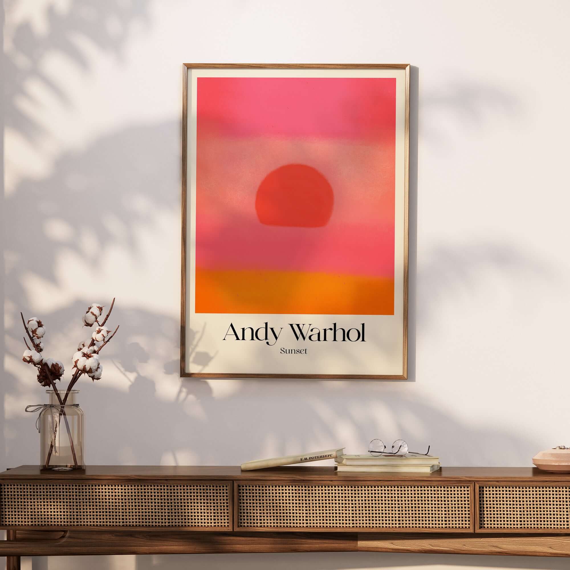 Andy Warhol Sunset Pink Orange Pop Art Print Modern Abstract Poster Wall Art displayed in a stylish interior setting.