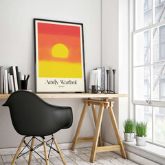 Andy Warhol Sunset Red Yellow Pop Art Abstract Print Modern Landscape Poster displayed in a modern workspace setting.