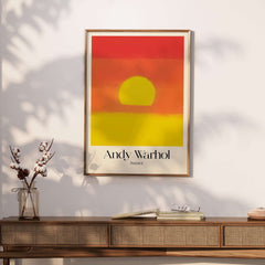 Andy Warhol Sunset Red Yellow Pop Art Abstract Print Modern Landscape Poster displayed on a stylish wall.