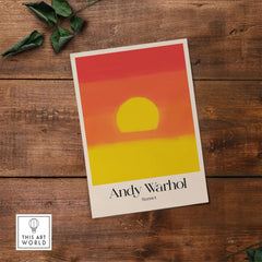 Andy Warhol Sunset Red Yellow Pop Art Abstract Print Modern Landscape Poster displayed on wooden background