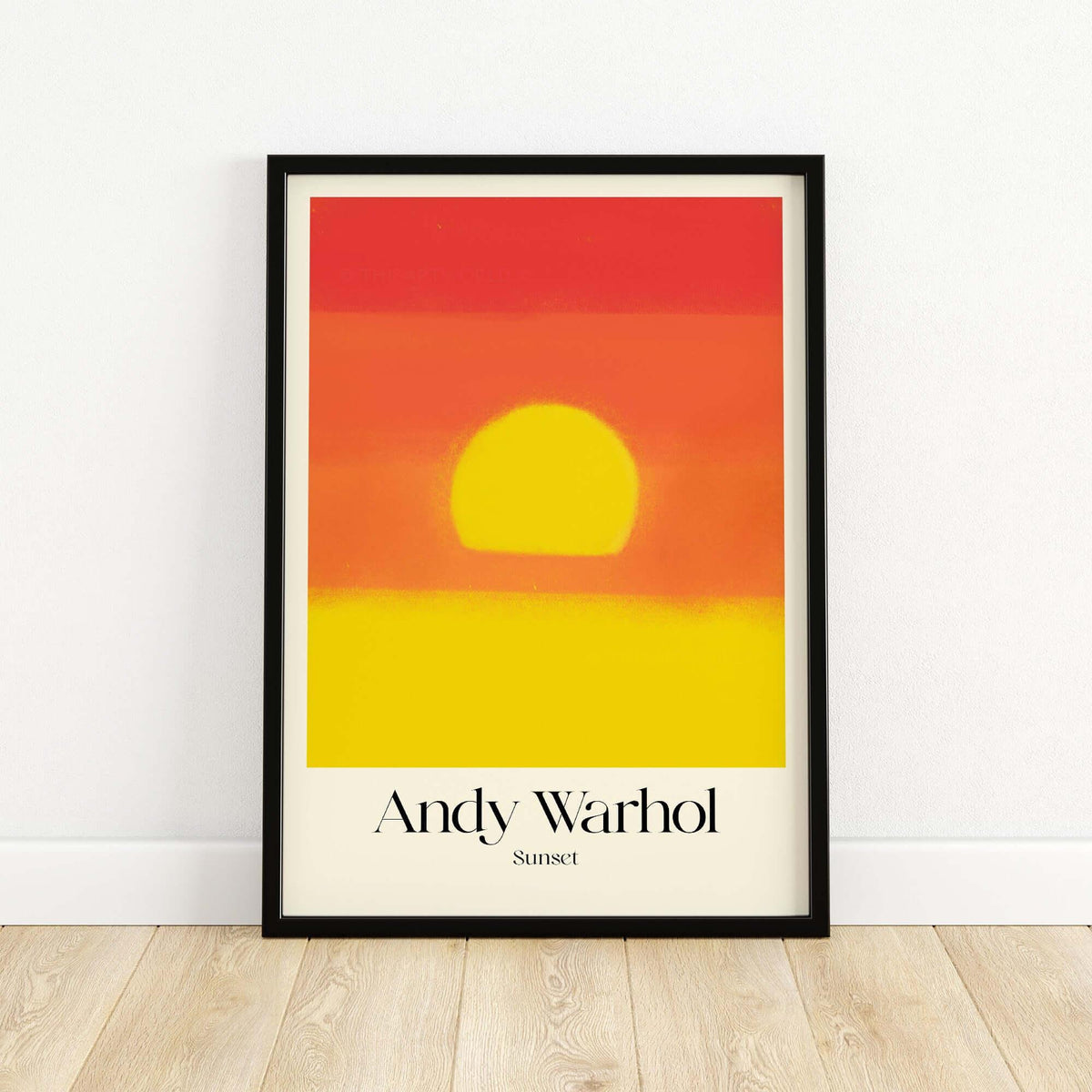 Andy Warhol Sunset Red Yellow Pop Art Abstract Print Modern Landscape Poster displayed on a wall with a bold sun image.