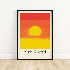 Andy Warhol Sunset Red Yellow Pop Art Abstract Print Modern Landscape Poster displayed on a wall with a bold sun image.