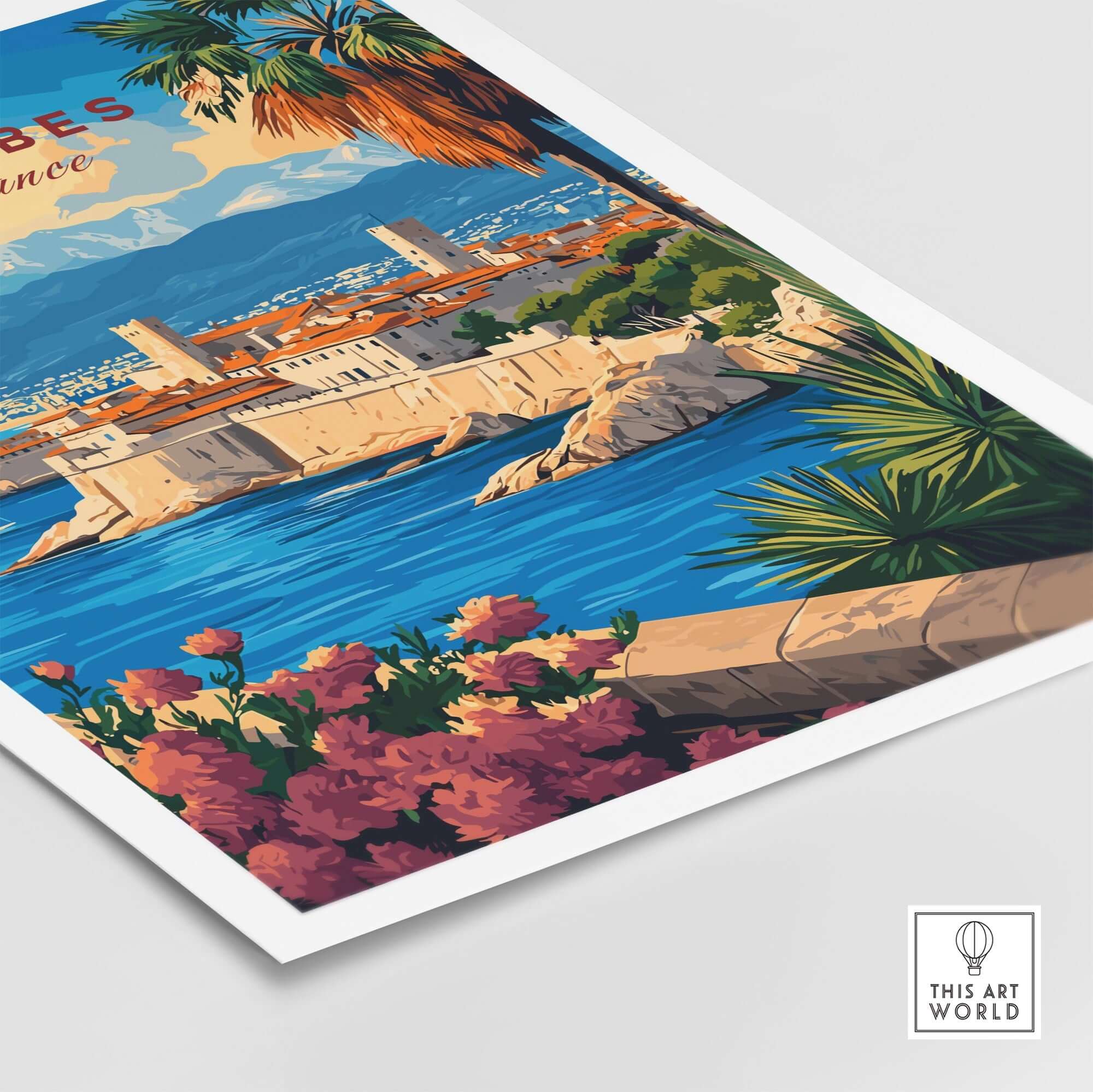 Antibes Travel Print showcasing the stunning coastal view of Antibes with vibrant flowers and palm trees.