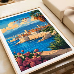 Antibes Travel Print showcasing a vibrant coastal scene in Antibes, France with picturesque buildings and flowers.