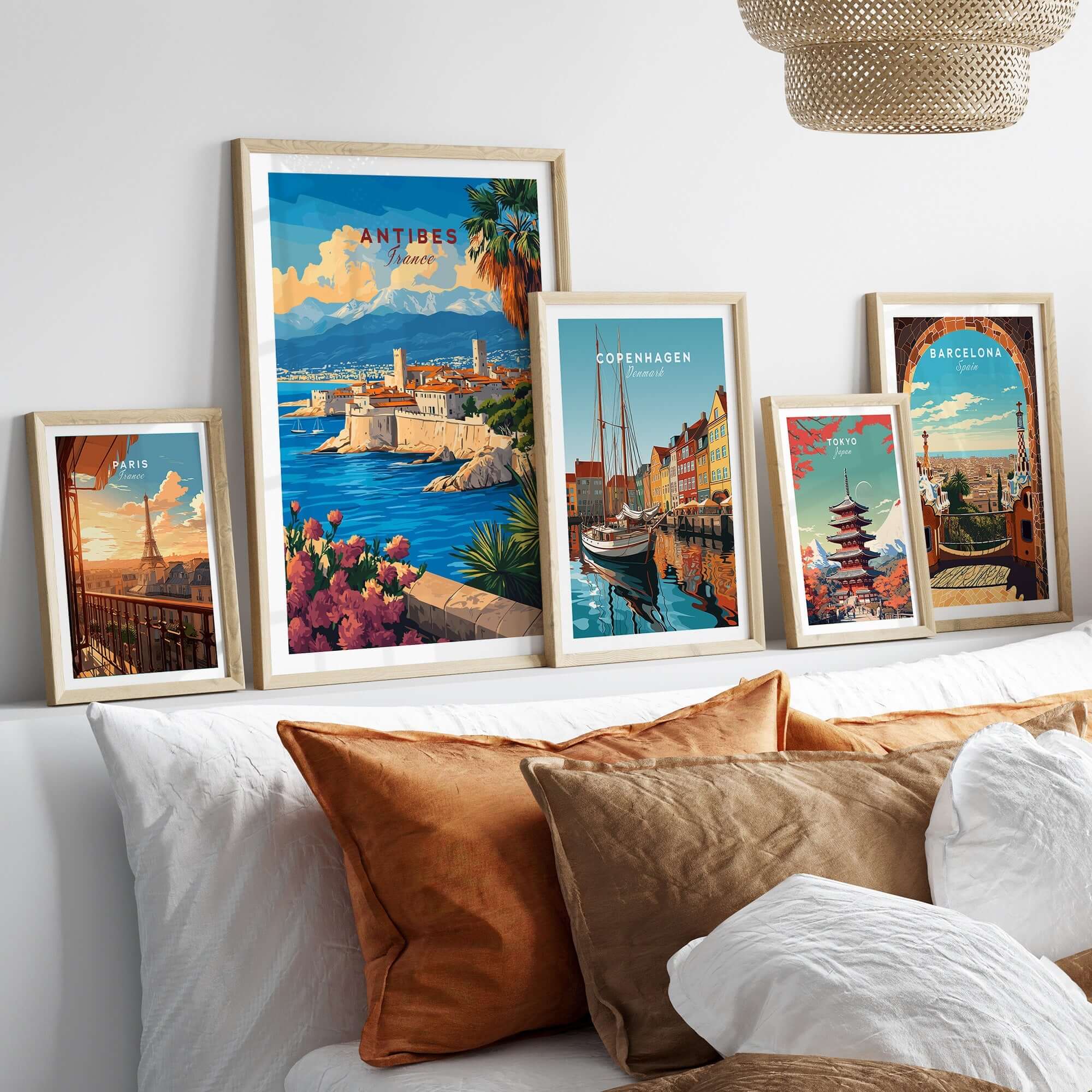 Antibes Travel Print art displayed in elegant frames, showcasing travel destinations and adding style to a cozy room.