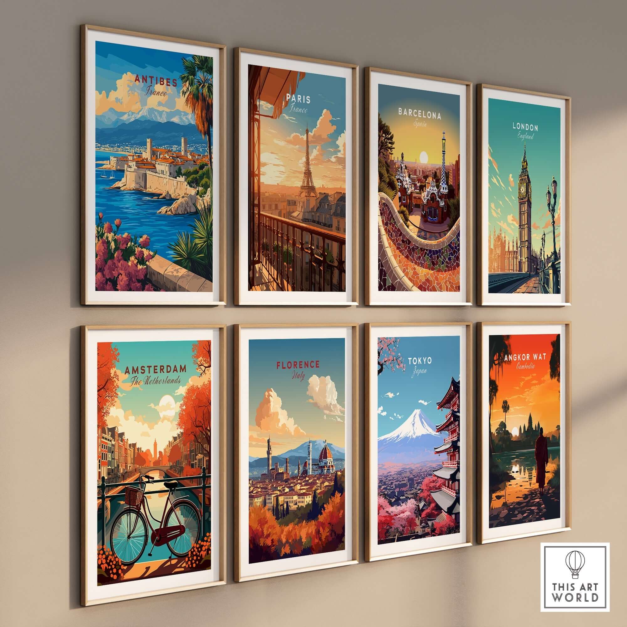 Antibes Travel Print and other city travel prints displayed on a wall, showcasing iconic destinations.