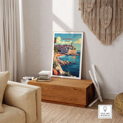Antibes Wall Art displayed in a stylish living room setting, showcasing vibrant coastal colors and Mediterranean charm.