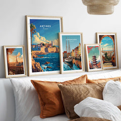 Antibes Wall Art Poster displayed with other city posters in a stylish home setting.