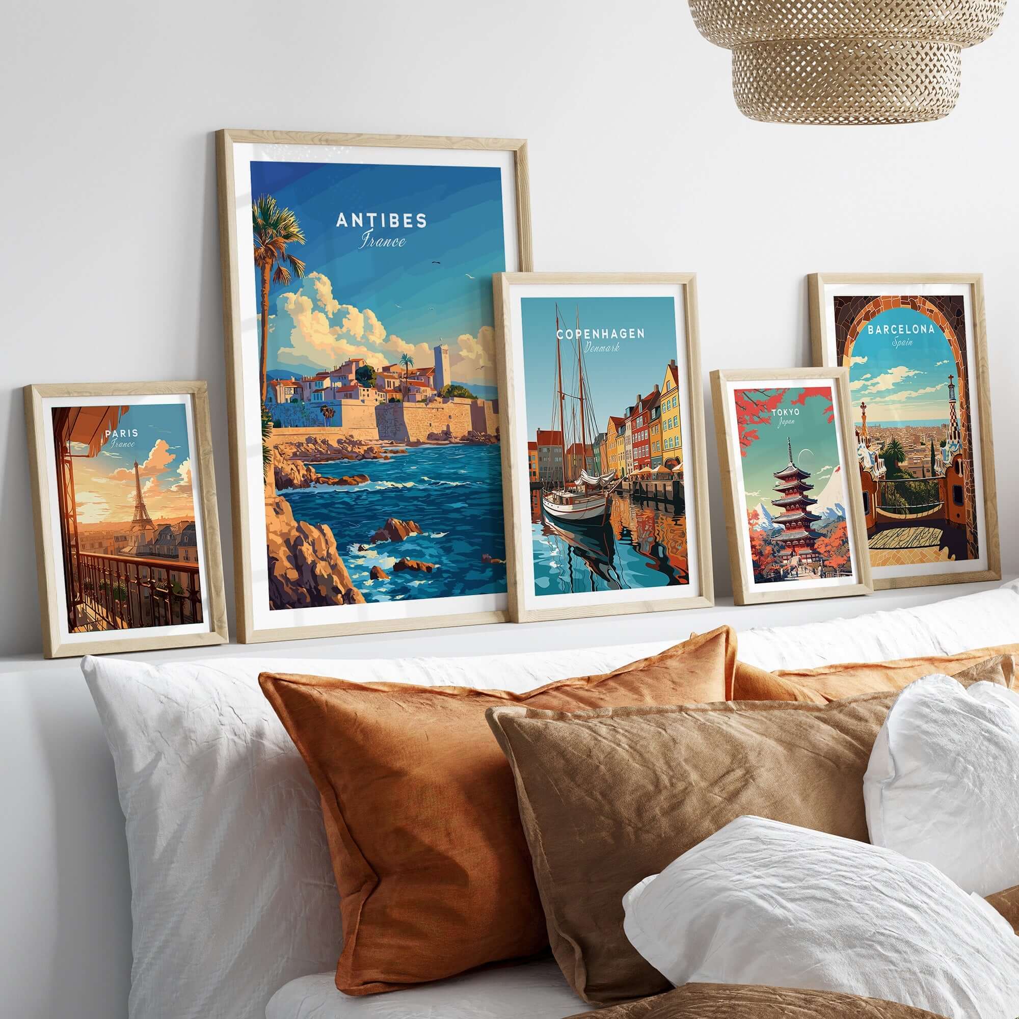 Antibes Wall Art Poster displayed with other city posters in a stylish home setting.