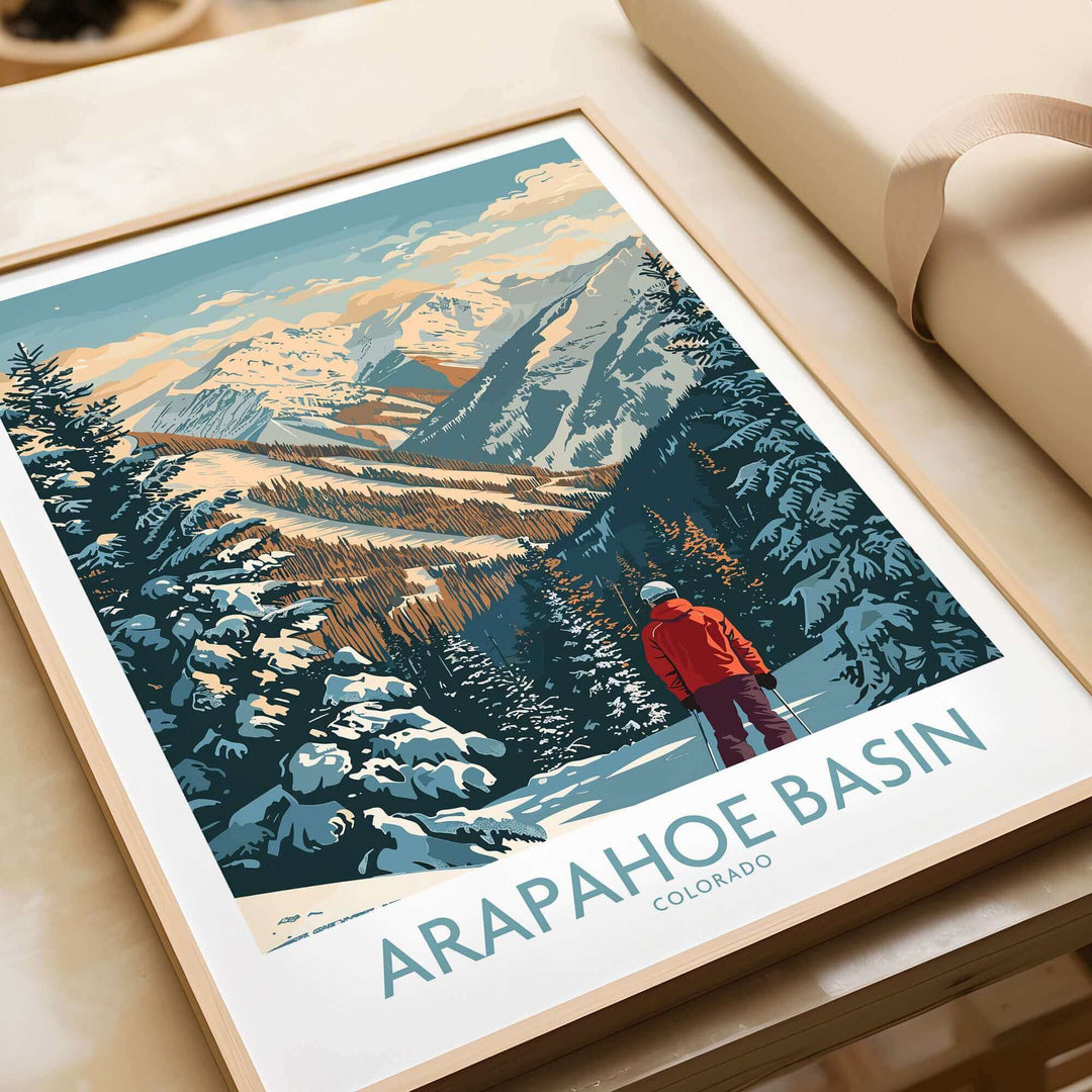 Arapahoe Basin Ski Poster featuring a skier overlooking snowy mountain slopes at the renowned Colorado ski resort. Perfect for winter decor.