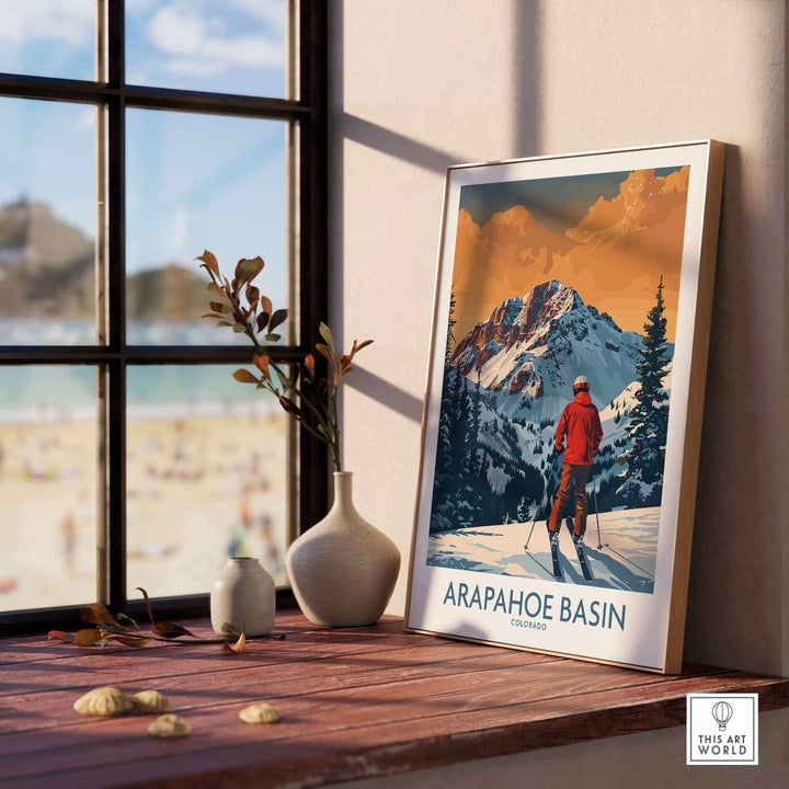 Arapahoe Basin ski print in a stylish frame, showcasing Colorado's mountain beauty in a cozy indoor setting.