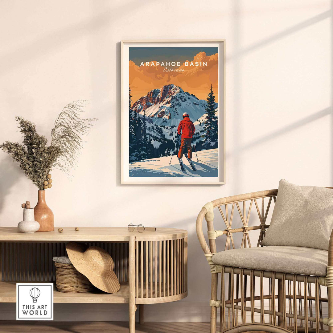 Arapahoe Basin travel poster displayed in a cozy home setting, showcasing stunning Colorado ski slopes and mountain scenery.