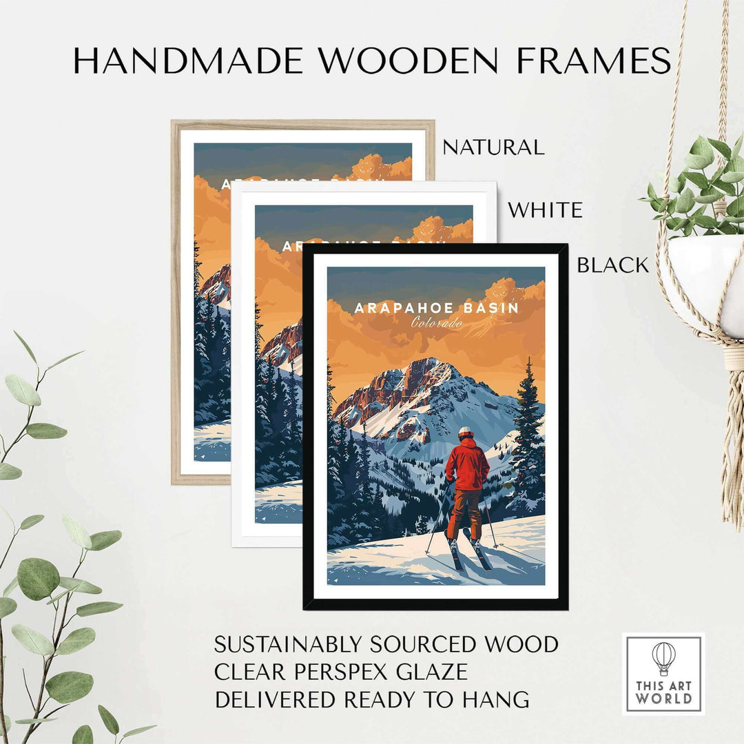 Handmade wooden frames in natural, white, and black showcasing Arapahoe Basin travel poster with mountain scenery.