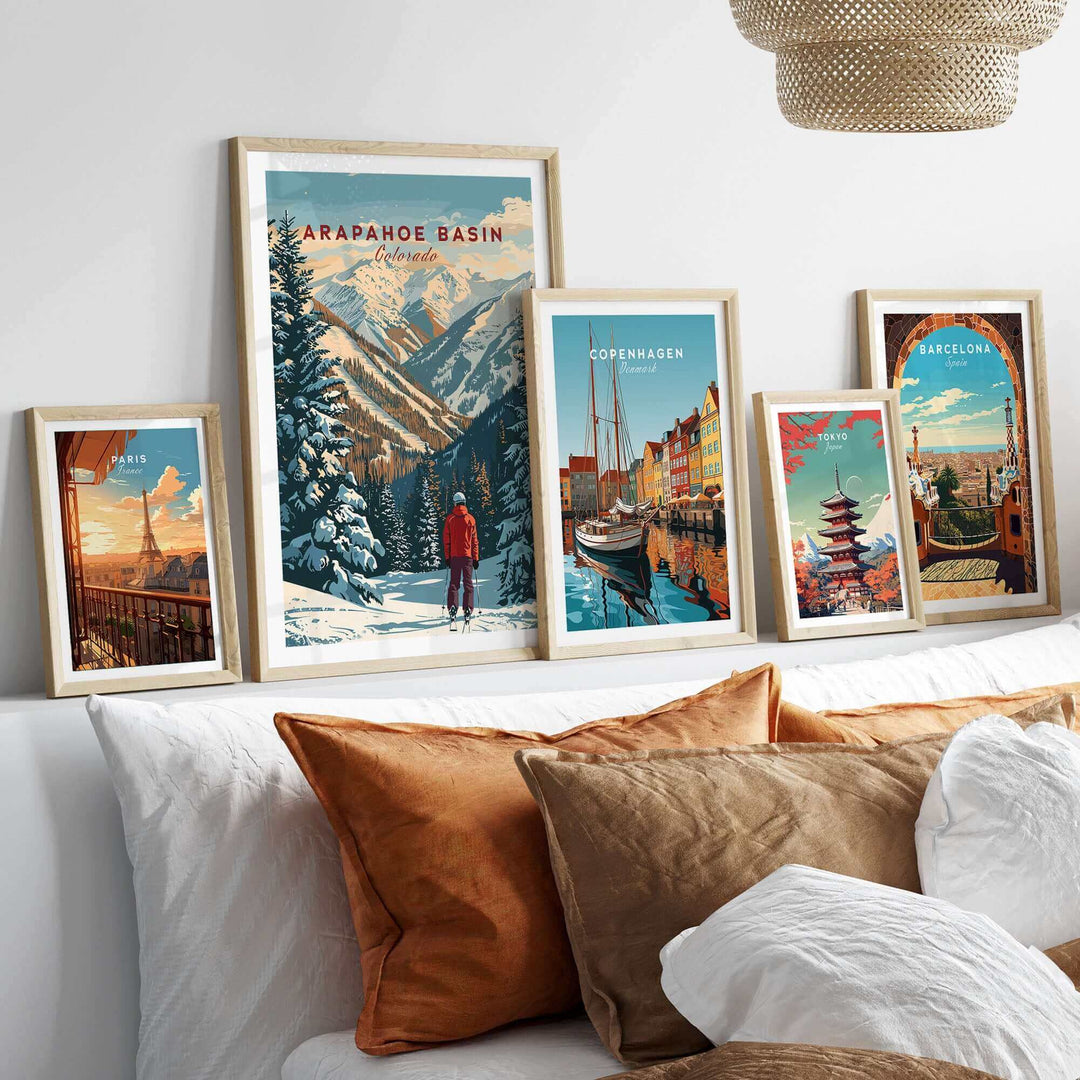 Arapahoe Basin wall art showcasing scenic mountain landscape with ski theme, part of a framed wall art collection above a couch.