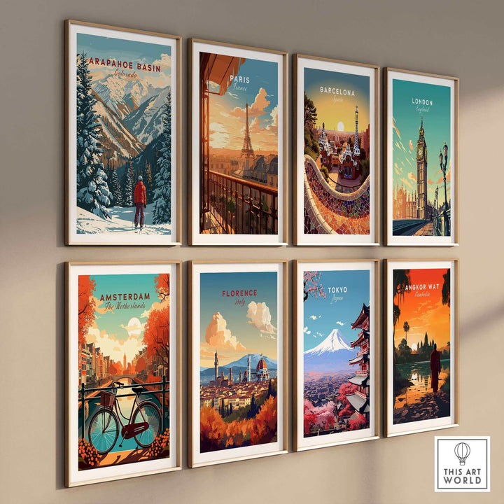 A collection of framed wall art featuring scenic landscapes including Arapahoe Basin, Paris, Barcelona, London, Amsterdam, Florence, Tokyo, and Bangkok.