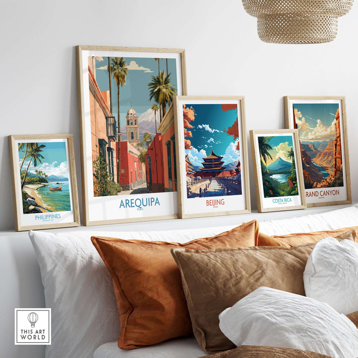 Vibrant travel posters of Arequipa, Beijing, Costa Rica, Grand Canyon, and the Philippines displayed on a cozy couch.