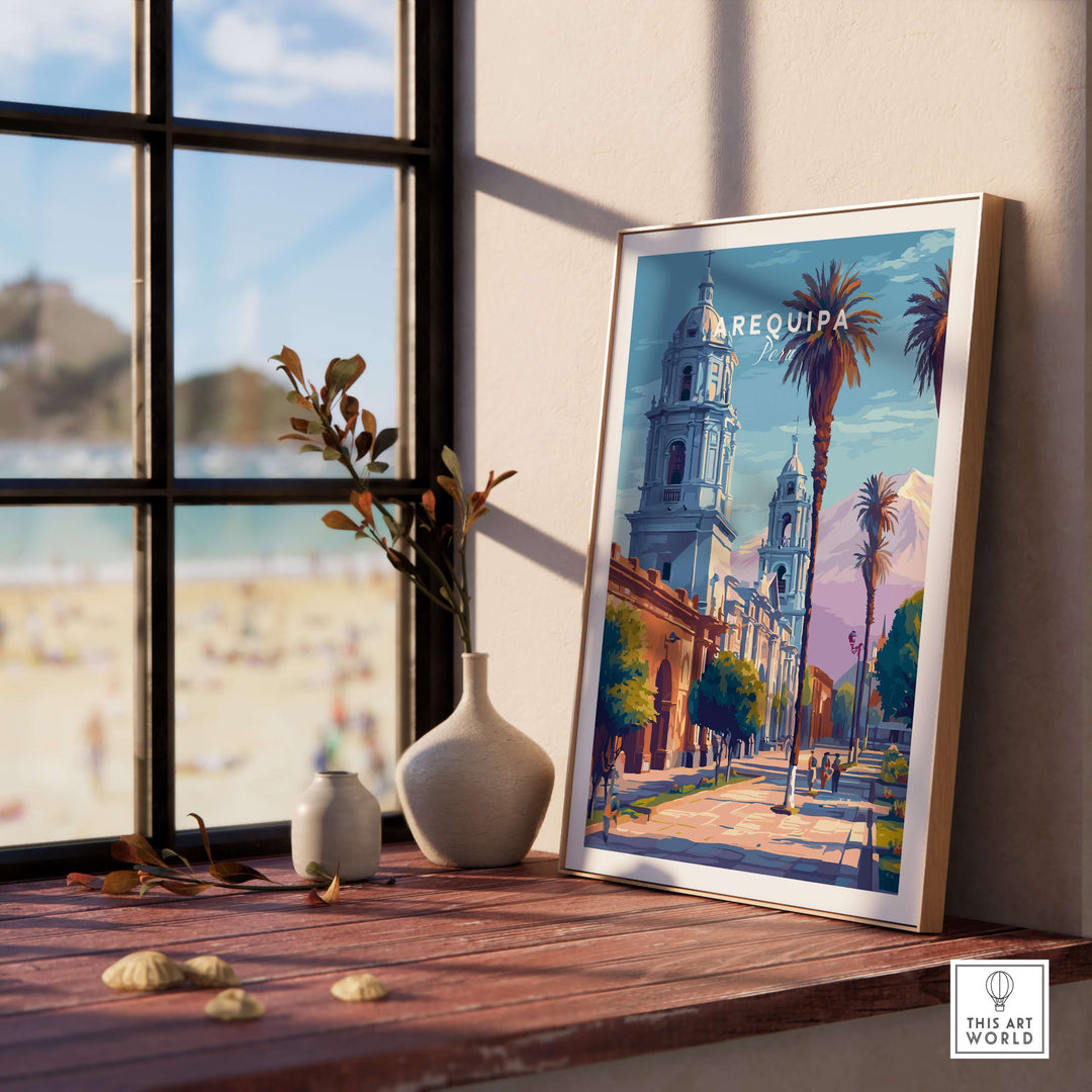 Arequipa travel print framed on a wooden table with a vase, showcasing vibrant colors and iconic architecture of Arequipa, Peru.