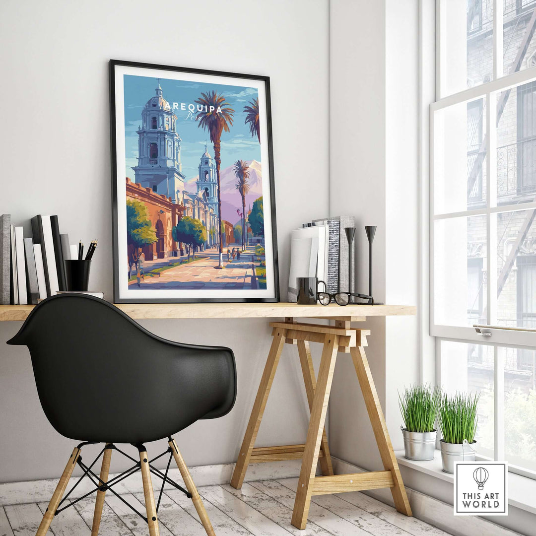 Framed Arequipa travel print displayed in a modern workspace, showcasing vibrant Peruvian culture.