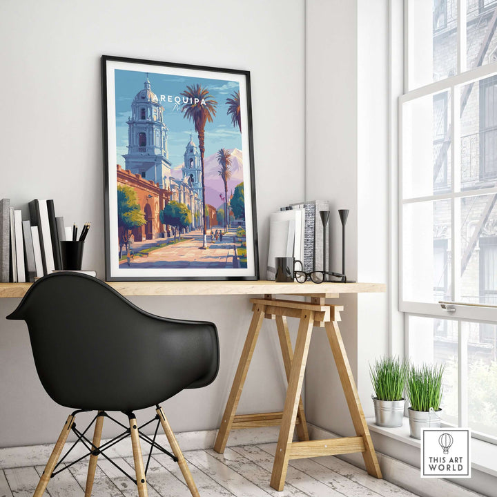 Framed Arequipa travel print displayed in a modern workspace, showcasing vibrant Peruvian culture.